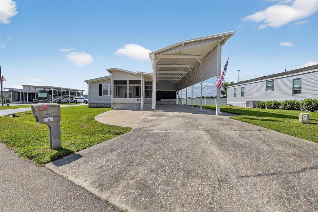 Photo of 4945 Shore Line Dr, Polk City, FL 33868 (MLS # L4956694)