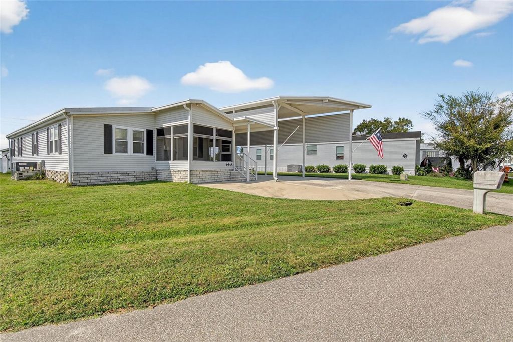 Photo of 4945 Shore Line Dr, Polk City, FL 33868 (MLS # L4956694)
