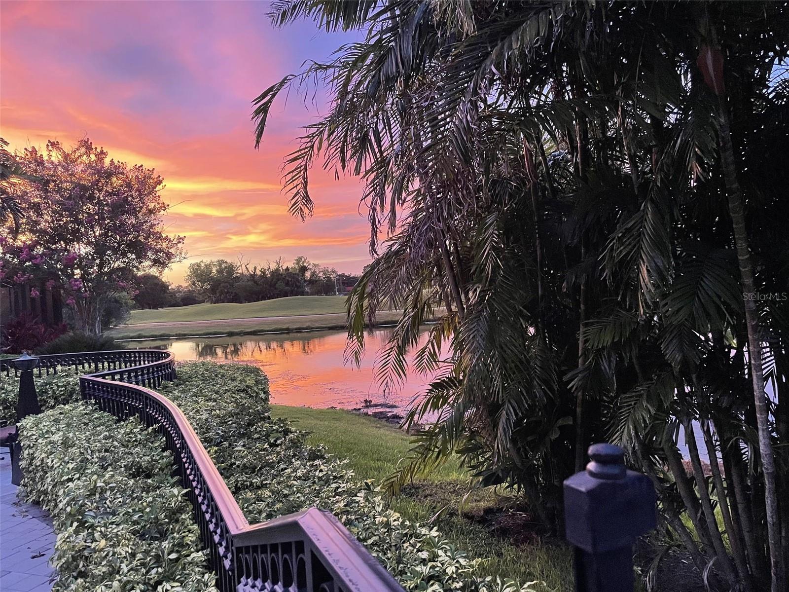 As the saying goes, let's get down to brass tacks. This has got to be one of the nicest homes, in one of the most prestigious communities, with one of the most ideal views in all of Pinellas County. The seller has lovingly cared for this home for over 25 years. Located on the 1st fairway of the world renowned Tom Fazio Signature designed golf course in the exclusive Copper Leaf section of The Bayou Club, this Ryland built home with custom floor plan rarely found in the community is sure to impress. With over 3,000 sq ft of living space, this residence features two master suites, a 3rd bedroom, plus an office (can be used as 4th bedroom), providing exceptional flexibility for multi-generational living, extended family, or hosting guests in style. New INTERIOR PAINT (July 2025), entire home inside and out wired for surround sound with volume/on off controls in every room, 6 new ceiling fans, a full stainless steel KitchenAid appliance suite, travertine flooring throughout, tray ceilings, the office with elegant built ins, and two massive king palms in the front yard, are just some of the tasteful features of this home. The Phillips Environmental custom built pool and spa complete with pavers, fountains, lighting, a bench that runs along the entire inside edge, Indonesian palms for privacy, custom iron fencing, and resort style cabana seating, make this home an entertainers dream! The Bardmoor Golf and Tennis club, complete with Pinellas County's largest pickle ball center, is also right at the your back gate. Piece of mind with a NEW TILE ROOF (JUNE 2025) AND 5 ton Trane NEW HVAC (JULY 2025), mean the big ticket items are done for years to come. TANKLESS HOT WATER HEATER (JAN 2018) Ask your Realtor about the list of upgrades attached in the MLS. Homes loved by their sellers, for this long, with this attention to detail, do not last. This is the no brainer you've been waiting for. Reach out today before it's gone!