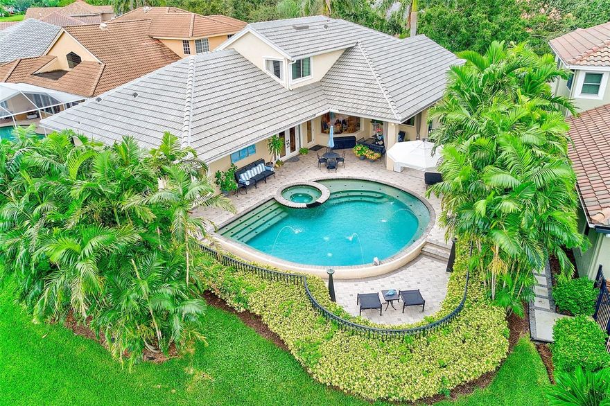 As the saying goes, let's get down to brass tacks. This has got to be one of the nicest homes, in one of the most prestigious communities, with one of the most ideal views in all of Pinellas County. The seller has lovingly cared for this home for over 25 years. Located on the 1st fairway of the world renowned Tom Fazio Signature designed golf course in the exclusive Copper Leaf section of The Bayou Club, this Ryland built home with custom floor plan rarely found in the community is sure to impress. With over 3,000 sq ft of living space, this residence features two master suites, a 3rd bedroom, plus an office (can be used as 4th bedroom), providing exceptional flexibility for multi-generational living, extended family, or hosting guests in style. New INTERIOR PAINT (July 2025), entire home inside and out wired for surround sound with volume/on off controls in every room, 6 new ceiling fans, a full stainless steel KitchenAid appliance suite, travertine flooring throughout, tray ceilings, the office with elegant built ins, and two massive king palms in the front yard, are just some of the tasteful features of this home. The Phillips Environmental custom built pool and spa complete with pavers, fountains, lighting, a bench that runs along the entire inside edge, Indonesian palms for privacy, custom iron fencing, and resort style cabana seating, make this home an entertainers dream! The Bardmoor Golf and Tennis club, complete with Pinellas County's largest pickle ball center, is also right at the your back gate. Piece of mind with a NEW TILE ROOF (JUNE 2025) AND 5 ton Trane NEW HVAC (JULY 2025), mean the big ticket items are done for years to come. TANKLESS HOT WATER HEATER (JAN 2018) Ask your Realtor about the list of upgrades attached in the MLS. Homes loved by their sellers, for this long, with this attention to detail, do not last. This is the no brainer you've been waiting for. Reach out today before it's gone!