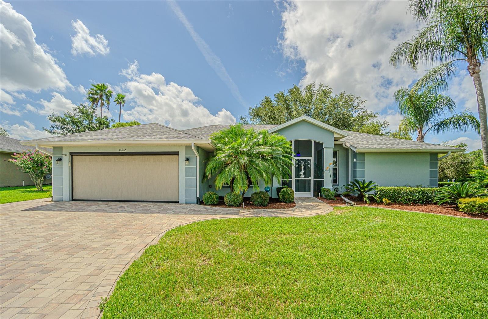 Here's a beautiful, updated 1,648 square foot home in the highly desirable Tampa Bay Golf & Country Club community. The home is completely updated and ready for immediate move-in. The kitchen is amazing and features solid wood, white cabinets (many of them), tasteful granite, and a backsplash. The huge primary bedroom features newer carpet and an amazing walk-in closet with organizers, as well as a completely updated en-suite with beautiful granite and a stunning shower. The home features three solar tubes, ensuring it remains bright without the need for lights. The guest bedrooms and bath are situated on the other side of the home for privacy. The guest bathroom has a newer state-of-the-art jetted walk-in bath that you have to see to believe! Enjoy your morning coffee (or afternoon wine) sitting in your luxurious lanai, with glass windows, enjoying all the wildlife in your private backyard...you'll soon discover why this sub-HOA is named Deer Hollow! The HUGE lanai adds 444 square feet of living area, on top of the 1,648 square feet! A beautiful paver driveway leads you to the screened two-car garage home on one of the best lots in the amazing Tampa Bay Golf & Country Club community. The lanai has ceramic tile flooring, upgraded windows, HVAC ducts, and the most amazing views you could imagine, including a beautiful pond and amazing golf course views. New roof installed November 2024. TBG&CC has two incredible golf courses, the 18-hole Championship course and a 9-hole executive course. The golf courses here are impeccable and very well maintained. Tampa Bay Golf & Country Club is Tampa Bay's premier active 55+ community featuring two swimming pools (the large resort-style pool has fountains and is heated to a balmy 80 degrees). Pickleball, tennis, cards, bocce, shuffleboard, cornhole and more activities than anyone could possibly do! Our new activities center has a HUGE fitness center with state-of-the-art fitness equipment, a beautiful billiards room, and an amazing card room. TBG&CC has no CDD and very affordable HOA charges, which include Cable/Internet/DVR and Mini Box. The Tampa Bay Golf & Country Club community is Tampa Bay's most desirable 55+ Active community. There is a ONE-TIME charge of $3,500.00 for the Tampa Bay Community Association Social Membership due at closing. All room sizes are approximate and should be confirmed by buyer. Furniture is available outside of contract.