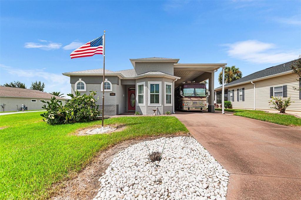 Photo of 344 Motorcoach Drive S, Polk City, FL 33868 (MLS # P4936220)