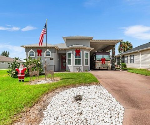 Photo of 344 Motorcoach Drive S, Polk City, FL 33868 (MLS # P4936220)