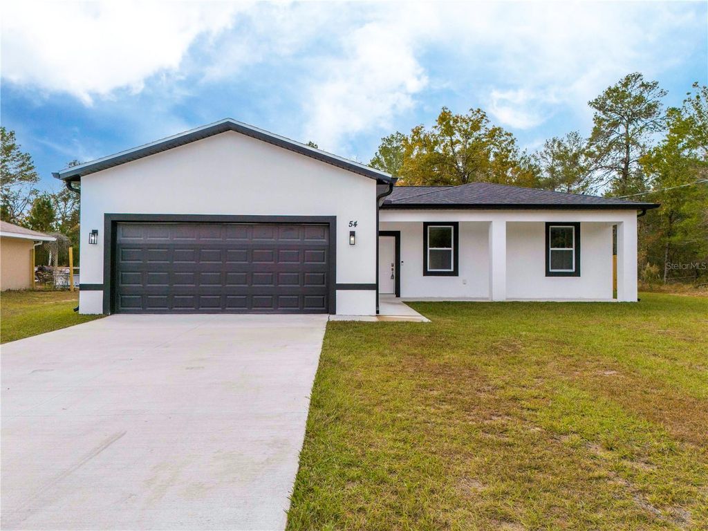 Photo of 54 Malauka Track, Ocklawaha, FL 32179 (MLS # O6293991)