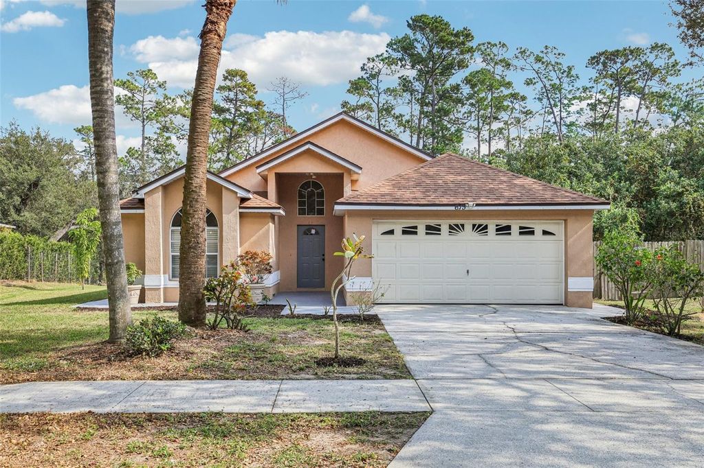 Photo of 615 Oakpoint Circle, Davenport, FL 33837 (MLS # O6362992)