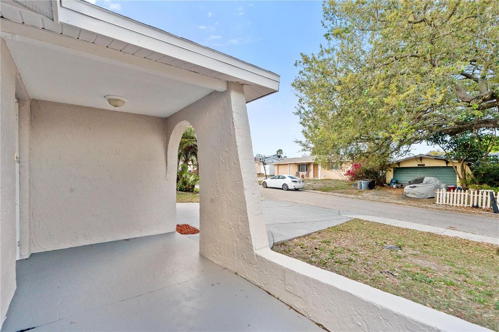 Photo of 9020 Hunt Club Lane, Port Richey, FL 34668 (MLS # W7883846)