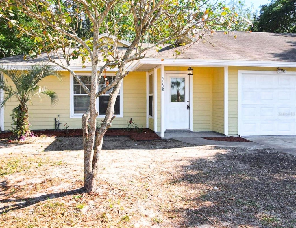 Photo of 6508 Coral Cove Drive, Orlando, FL 32818 (MLS # O6436531)