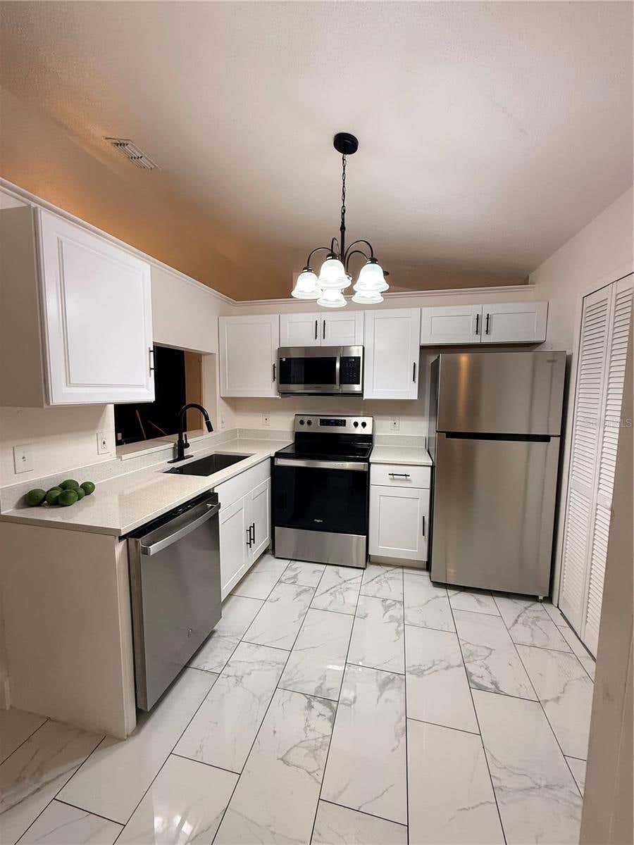 Photo of 6508 Coral Cove Drive, Orlando, FL 32818 (MLS # O6436531)
