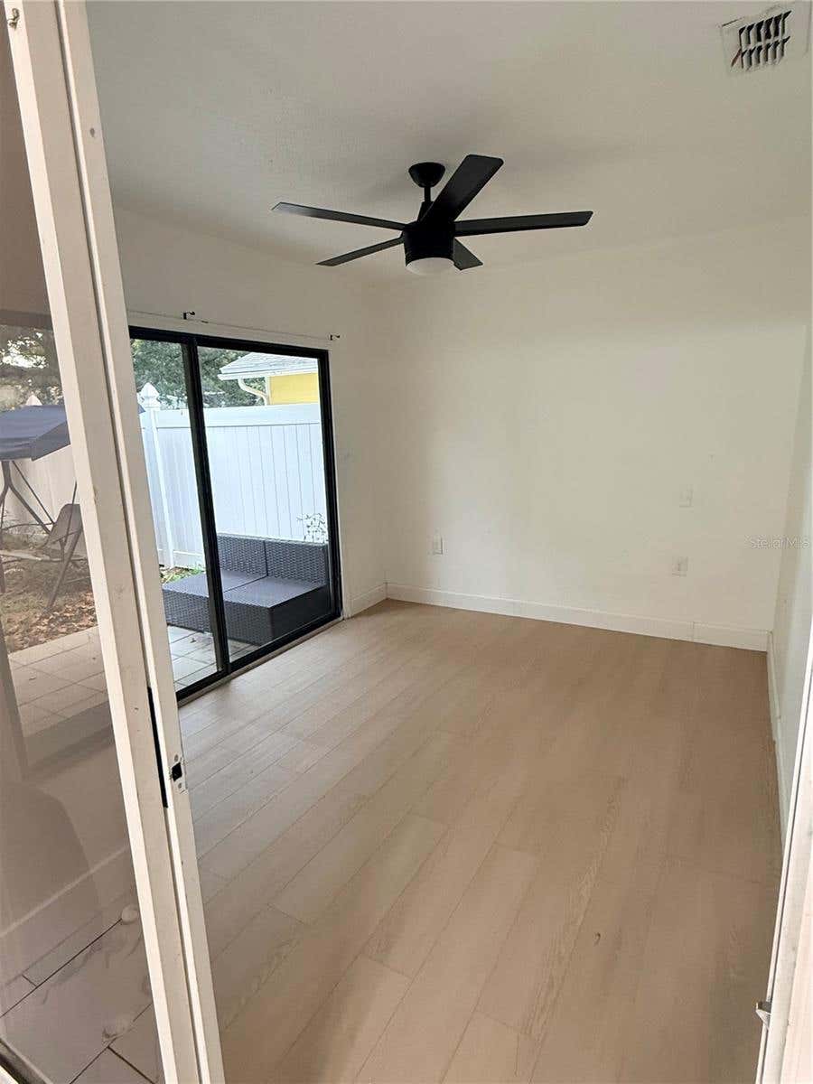 Photo of 6508 Coral Cove Drive, Orlando, FL 32818 (MLS # O6436531)