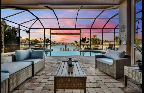 Photo of 5024 SW 17th Ave, Cape Coral, FL 33914 (MLS # A4691594)