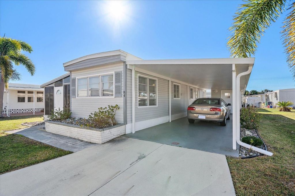 Photo of 84 Del Rio Drive, Palmetto, FL 34221 (MLS # A4680517)