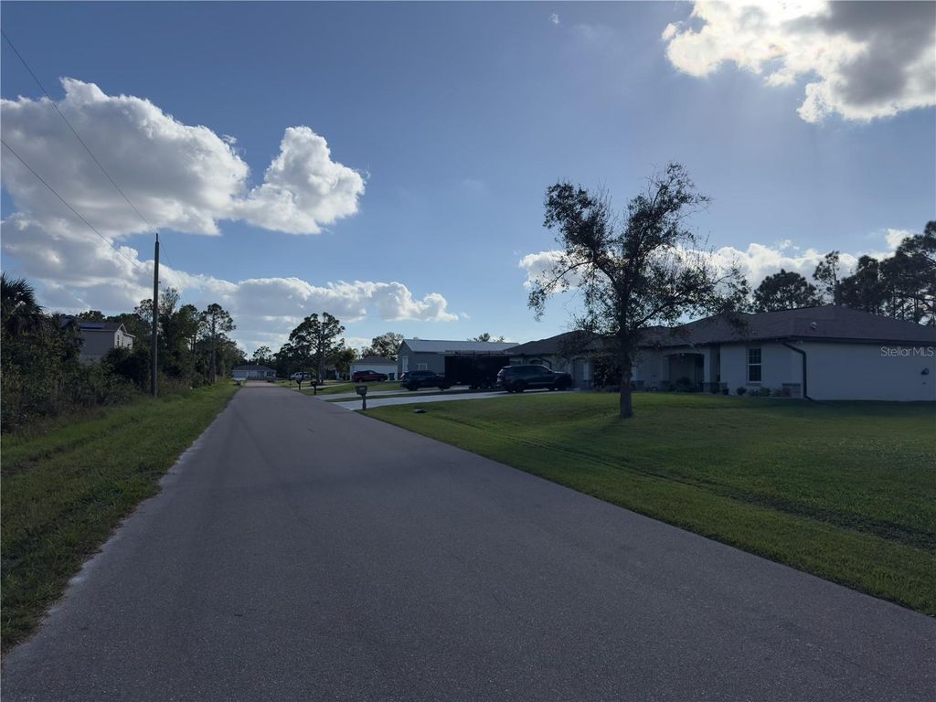 Photo of 338 Hyacinth Street, Port Charlotte, FL 33954 (MLS # C7500318)