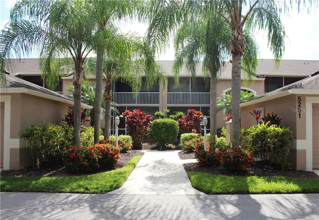 Ready to relax in paradise? This turnkey 2 bedroom, 2 bath condo has everything you are looking for! With a bohemian coastal design through out you will find yourself truly lost in delight. Nuzzled in the nature, this tropical lake front condo is the perfect location for you and your family. When entering this tropical condo, you will find yourself completely surrounded by nature, with gorgeous manicured landscaping all around. The front patio offers seating for two. Perfect spot to watch the sunrise! The living room will be you and your families go to spot. With a large sectional and movable ottoman this is the perfect area to relax after a long day of adventure. With a sliding glass door leading out to the patio natural light is never an issue! The back patio is what makes this condo exquisite, with panoramic views of the lake and seating for two this will be the spot to enjoy breakfast, lunch and dinner! The dining table has large plush chairs, that can accommodate up to four comfortably. This newly updated kitchen has all the essential you need! With brand new stainless steel appliance’s, and a wonderful wine cooler that will keep up to six bottles of wine chilled to perfection! Adjacent to the living room you will find a stunning master suite. Which boats a king bed and plenty of space for your belongings. With a large paned window overlooking the lake, this master oasis will sure to leave you amazed. The master bathroom offers a lovely escape. With a large walk in shower, and plenty of vanity space for you and your loved ones. The guest bedroom offers a charming queen bed, with plenty of closet space. Across you will find the guest bathroom, that is breathtaking! Lined with gorgeous wallpaper, and new shower fixture you’ll find yourself unwinding after a day at the beach. Take some time and make sure to stop by Tee Side Patio Café for food located just minutes from the condo, this little gem of a restaurant is the perfect pit stop for quick lunch. Sorry no furry friends please! Heritage Oaks Golf & Country Club will set up a reserve upon your arrival of $500 that will be charged to your credit card for you to utilize all the amenities of Heritage Oaks. Membership entitles the guest to use the golf course, driving range, tennis, swimming pools, fitness center, restaurant, social and other facilities of the country club. You'll never run out of things to do in this wonderful community! Golf fees apply. Heritage Oaks Golf and Country Club has a mandatory registration membership transfer fee of $200.00(November through April) or $50 (May through October) Escape to the white sandy beaches of Siesta Key, Lido Key or Longboat Key just a few minutes away or lounge by the community pool and spa – the choice is yours. Take advantage of premium shopping and dining along the infamous St. Armand’s Circle. If you’re looking for outdoor adventure, get lost amid the labyrinth of mangrove tunnels and explore their unique ecosystem aboard a rented kayak or stand-up paddleboard in South Lido Beach Park, or hike the Northern Nature Trail. Enjoy an array of artistic & cultural events in Downtown Sarasota, such as the Sarasota Opera, the Sarasota Orchestra, ballet, theatre, the infamous Ringling Art Museum, Maria Selby Botanical Gardens, Marina Jacks for boat tours, and more shopping and nightlife than you can imagine.