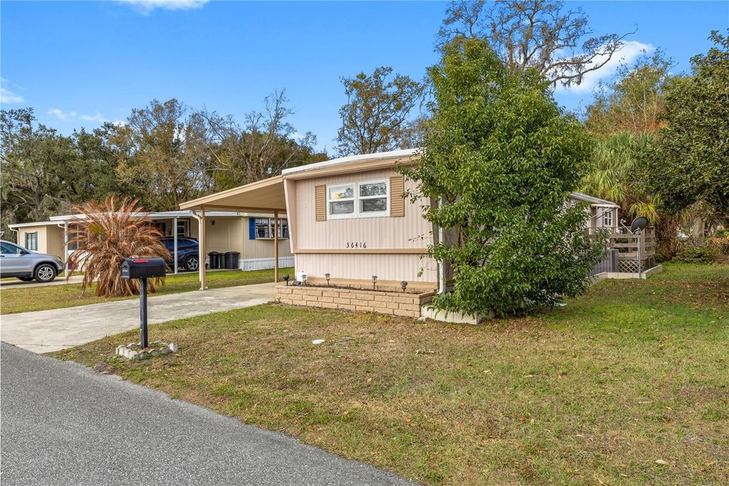 Photo of 36416 Cordova Circle, Zephyrhills, FL 33541 (MLS # TB8483351)