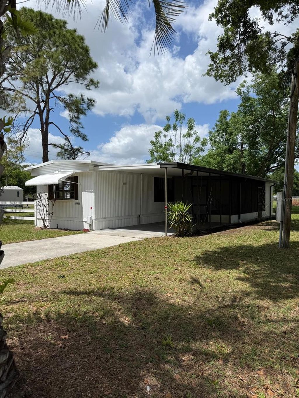 Photo of 37021 Pauls Drive, Zephyrhills, FL 33541 (MLS # TB8495164)