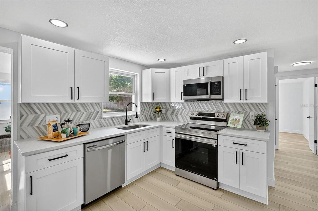 Photo of 1516 Sentinel Street, Holiday, FL 34690 (MLS # TB8435117)