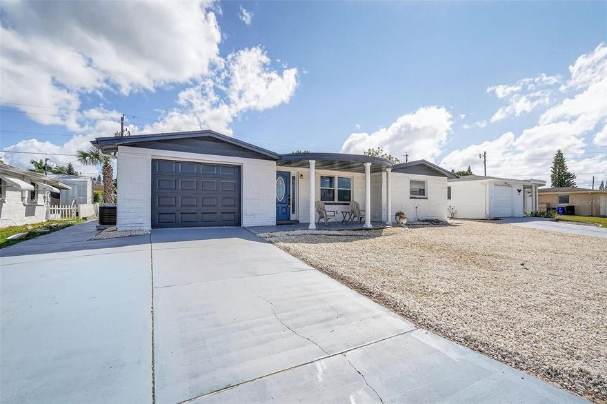 Beautifully Updated 2 Bedroom, 1.5 Bath Block Home in Holiday – New A/C, Roof (2022), No HOA, No Flood Zone

This fully updated 2-bedroom, 1.5-bathroom block home with a 1-car garage offers comfort, style, and low-maintenance living in a quiet Holiday neighborhood. Featuring a new A/C system, roof from 2022, and newer insulated double-pane vinyl windows, this home is move-in ready and designed for easy Florida living.

Inside, you'll find luxury vinyl tile flooring throughout, with tasteful porcelain tile in the full bathroom. The kitchen and bathrooms have been carefully renovated with real wood cabinets (plywood construction), soft-close doors, dovetail drawers, and quartz countertops. The kitchen stands out with a modern glass herringbone backsplash and brand-new stainless steel appliances, combining function and visual appeal.

Additional highlights include fresh paint inside and out, a spacious Florida room that opens to a screened-in back patio, a welcoming front porch, and a low-maintenance rock yard. The double-wide driveway and sidewalk to the back porch offer convenience, while the large backyard shed provides extra storage.

Located in a no HOA, no flood zone area, with easy access to Tampa, Pinellas County, shopping, entertainment, and the nearby beautiful Florida Gulf beaches, this home offers both flexibility and peace of mind—with no flood insurance required.

Schedule your private showing today!