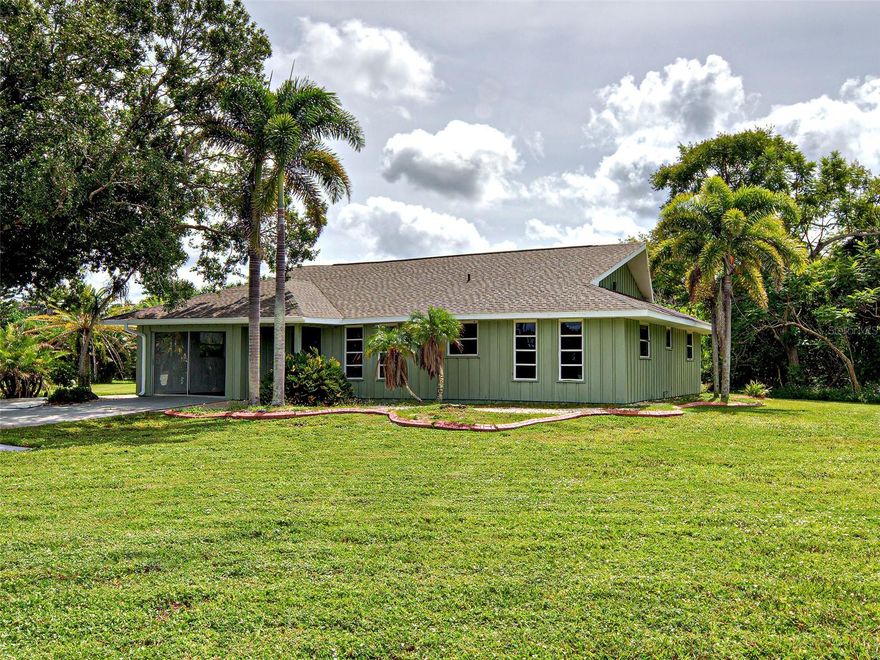 HIDDEN GEM!!  LOCATED IN HISTORIC OLD ENGLEWOOD VILLAGE DISTRICT - THIS IS A UNIQUE OPPORTUNITY TO PURCHASE TWO PARCELS FOR ONE GREAT PRICE!  ONE LOT HAS A 3 BEDROOM 2 BATH HOME INCLUDING AN ATTACHED STUDIO. TOTAL 4 BEDROOMS AND 2.5 BATHROOMS. FULL ROOF REPLACEMENT - UPDATED ELECTRICAL PANEL - NEW FLOORING - CEILING FANS AND OTHER RECENT INTERIOR UPDATES.
USE THE HOUSE AS RENTAL INCOME WHILE YOU PLAN YOUR DREAM HOME FOR THIS 2 ACRE ESTATE PROPERTY. THIS LOT SIZE IS HARD TO FIND AND IS LOCATED ON A DEAD-END ROAD, GIVING YOU PRIVACY WITH WATERFRONT VIEW OF THE TRANQUIL SPRING-FED NATURAL POND WITH AN ABUNDANCE OF WATERFOWL.      
The vision brings a large family estate with a beautiful setting. Room for outbuildings, workshops, RV barns, greenhouse, and additional accessory dwelling unit or guest house.  Tons of open space for that food forest or organic garden! 
This property is just a few miles from Manasota Key with 11 miles of beautiful beaches. 1.3 mile walk or bike ride to DEARBORN STREET - The center of town for live entertainment, shopping, restaurants, coffee shops and specialty stores.
PARCEL ID #0496-11-0025 & ID #0496-11-0022 INCLUDED IN SALE.
THIS IS A PRIMO LOCATION WITH GRAND OPPORTUNITY! CALL NOW TO SCHEDULE A SHOWING.