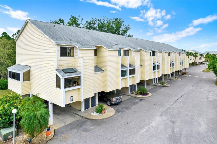 Step inside this beautiful and updated 2BR/2BA townhouse in the Gulf-front community of Island Club. As you enter, the bright kitchen welcomes you with granite countertops, updated appliances, and a skylight that fills the space with natural light. Just off the kitchen, a full bath with a walk-in shower is perfect for guests.

Continue upstairs to discover two spacious bedrooms and a full bath. The primary bedroom features large windows with peaceful views of the saltwater and bird conservation preserve, creating a relaxing retreat. The second bedroom is equally inviting, ideal for family, guests, or a home office.

This move-in ready home also offers hurricane-impact windows (2016), roof (2018 with solar vent fans), new A/C and ductwork (2019), hot water heater (2018), and a convenient laundry nook under the stairs. Covered tandem parking for two cars is directly under the unit.

Island Club residents enjoy Gulf-front sunsets, a sparkling pool, tennis courts, and well-maintained grounds. HOA includes exterior maintenance, flood insurance, reserves, roof, water/sewer, Cable, Internet and more. Located near Sunset Beach, Fred Howard Park, the Sponge Docks, and local shops and dining.