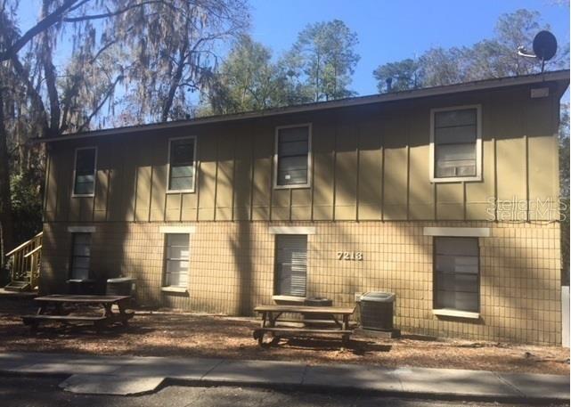 2/1 upstairs unit. vinyl wood floors throughout. Washer and dryer hookups located in the unit. Lawn care and pest control included.