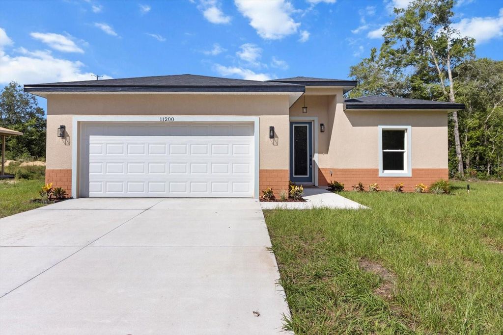 Photo of 11200 N Terra Cotta Drive, Citrus Springs, FL 34434 (MLS # O6320965)