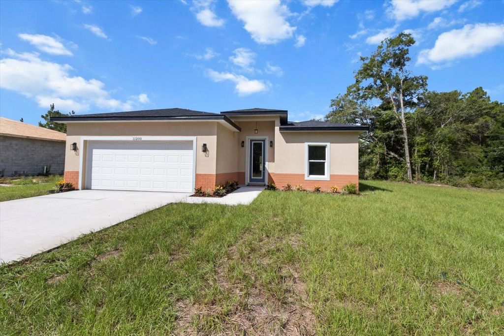 Photo of 11200 N Terra Cotta Drive, Citrus Springs, FL 34434 (MLS # O6320965)