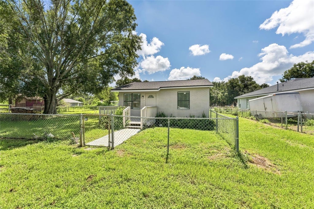 Photo of 652 N Jackson Street, Eagle Lake, FL 33839 (MLS # TB8547514)