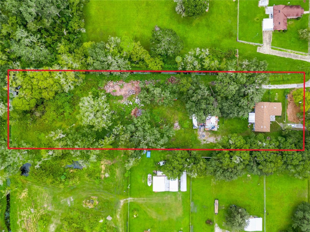 Photo of 215 John Carroll Road E, Lakeland, FL 33801 (MLS # O6447306)