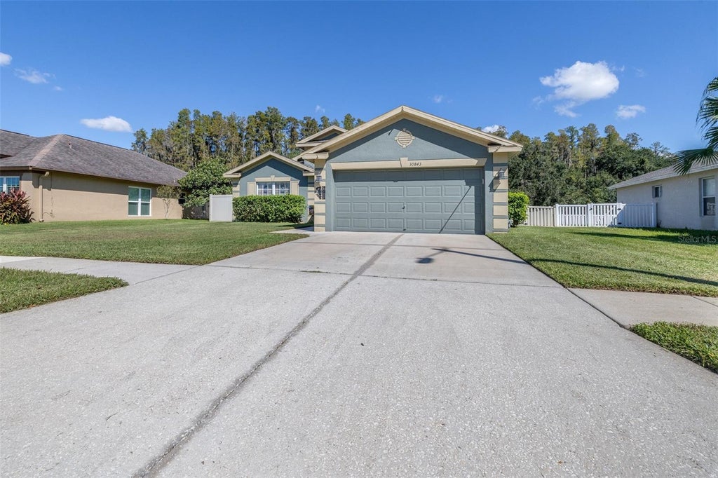 Photo of 30843 Luhman Court, Wesley Chapel, FL 33543 (MLS # L4965872)