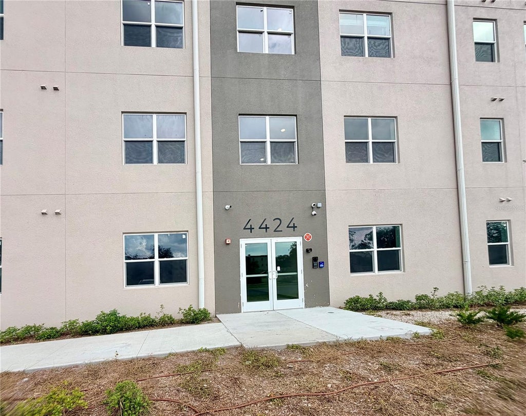 Photo of 4424 S Texas Avenue #1-302, Orlando, FL 32839 (MLS # O6430802)