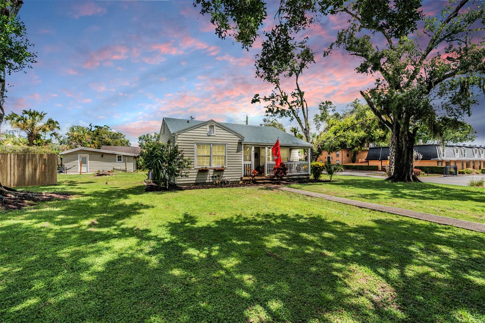 Welcome to 901 & 903 Cornelius Ave, a rare double-lot (additional parcel included with the sale) opportunity in the heart of Tampa! This property is packed with value and versatility, featuring not only a spacious main home but also an attached efficiency and a detached full mother-in-law suite. Perfect for multi-generational living, Airbnb, or strong income-producing potential. Step up to the spacious covered front porch, the perfect spot to enjoy morning coffee. Inside, you’ll find a bright, open great room floor plan that flows into a 3 bedroom, 2 bath with an attached efficiency with its own entrance, adding another bedroom & bath. The updated kitchen boasts stainless steel appliances and plenty of storage. The master suite is generously sized with a large closet and a private bath. En-suite Bath features Newer granite vanity & step-in shower. 2 additional bedrooms share an adjacent Bath. The detached suite at the back of the lot with pavered walkway and patio offers a complete setup for guests, tenants, or extended family with full kitchen & bath. Outside, the generous front yard provides curb appeal and extra space, while the double lot gives you room to spread out. Location is everything! Just minutes from Tampa International Airport, Downtown Tampa, major shopping, top dining, and the area’s best beaches. Homes in this neighborhood rarely come available, making this an incredible opportunity you don’t want to miss! 903 Cornelius A-02-29-18-3HC-000004-00015.0 included with the price!