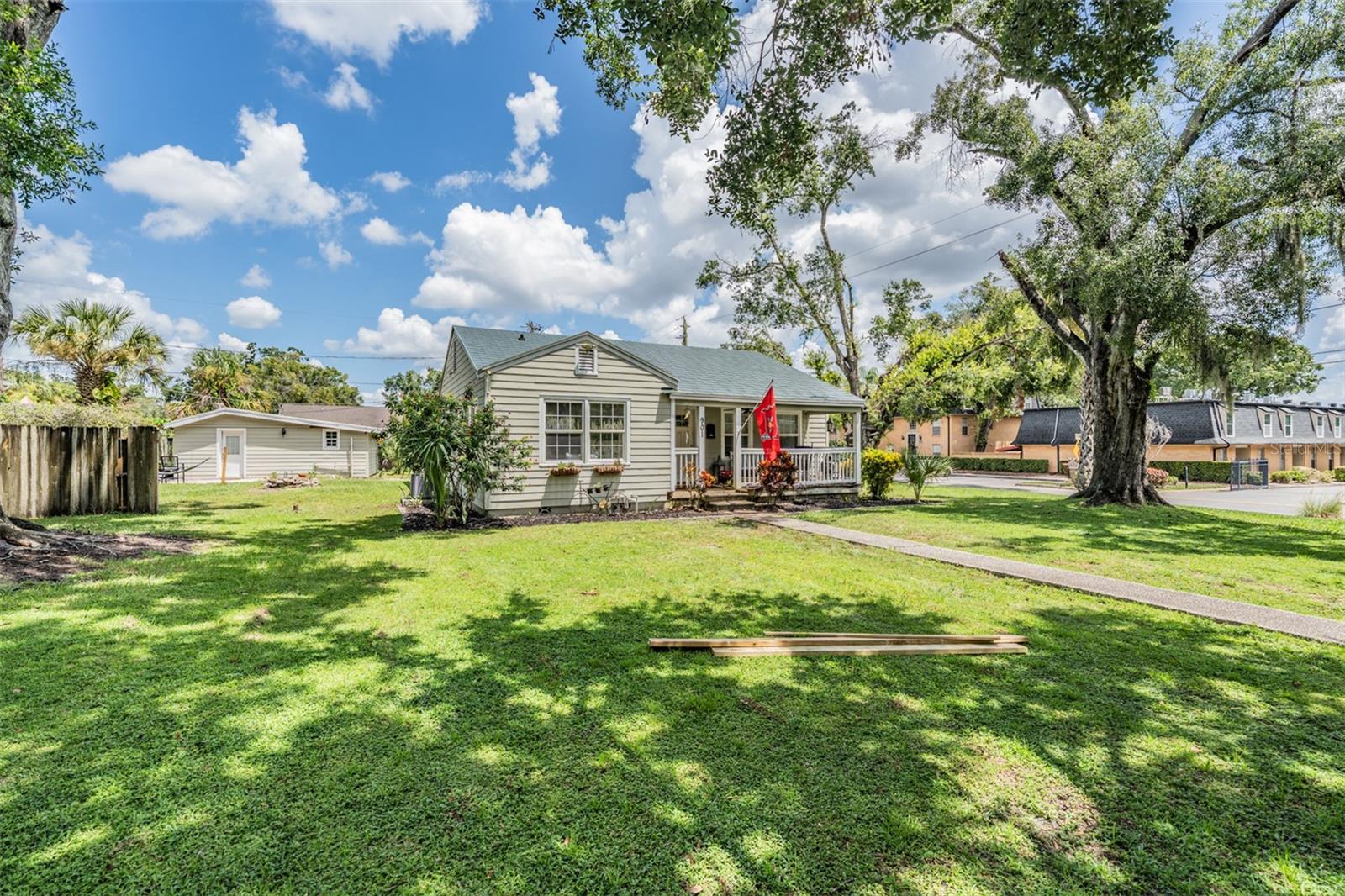 Welcome to 901 & 903 Cornelius Ave, a rare double-lot (additional parcel included with the sale) opportunity in the heart of Tampa! This property is packed with value and versatility, featuring not only a spacious main home but also an attached efficiency and a detached full mother-in-law suite. Perfect for multi-generational living, Airbnb, or strong income-producing potential. Step up to the spacious covered front porch, the perfect spot to enjoy morning coffee. Inside, you’ll find a bright, open great room floor plan that flows into a 3 bedroom, 2 bath with an attached efficiency with its own entrance, adding another bedroom & bath. The updated kitchen boasts stainless steel appliances and plenty of storage. The master suite is generously sized with a large closet and a private bath. En-suite Bath features Newer granite vanity & step-in shower. 2 additional bedrooms share an adjacent Bath. The detached suite at the back of the lot with pavered walkway and patio offers a complete setup for guests, tenants, or extended family with full kitchen & bath. Outside, the generous front yard provides curb appeal and extra space, while the double lot gives you room to spread out. Location is everything! Just minutes from Tampa International Airport, Downtown Tampa, major shopping, top dining, and the area’s best beaches. Homes in this neighborhood rarely come available, making this an incredible opportunity you don’t want to miss! 903 Cornelius A-02-29-18-3HC-000004-00015.0 included with the price!