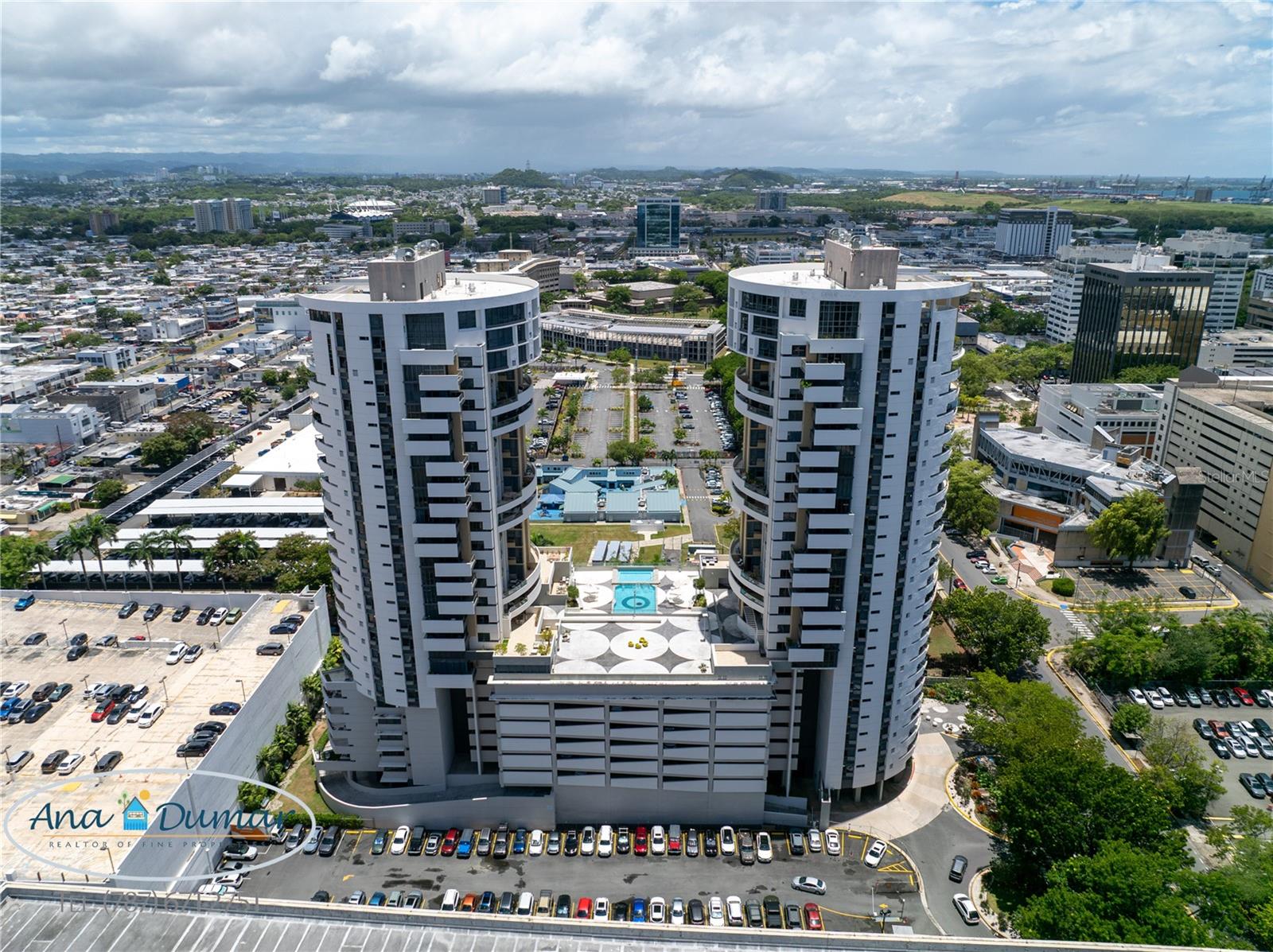 Luxury City Living at Quantum Metrocenter – Hato Rey, San Juan Live in the heart of Puerto Rico’s iconic financial district, La Milla de Oro, at the well-known Quantum Metrocenter, one of the tallest and most luxurious residential towers on the island. This stunning 1,936 sq. ft. apartment features an open-concept layout with 2 bedrooms, 2 bathrooms, and the flexibility to convert a spacious family room into a third bedroom. Floor-to-ceiling windows and an expansive balcony allow you to enjoy panoramic views of San Juan’s dynamic skyline, bringing natural light and urban elegance into every corner. The home boasts a beautifully appointed master suite with a walk-in closet and a spa-style bathroom, complete with dual vanities, whirlpool tub, and a separate shower. Additional highlights include a modern kitchen, formal dining and living areas, an office space, a functional laundry room, and soaring ceilings with top-of-the-line finishes throughout. Quantum Metrocenter offers an unmatched lifestyle with world-class amenities, including: Resort-style pool, jacuzzi, and solarium State-of-the-art fitness center Movie theater, activity center, and meeting rooms Dog park, playground, and outdoor kitchen Elegant lobby, 24/7 security, and closed-circuit surveillance Full electric generator and water cistern ensuring uninterrupted comfort 3 elevators in each tower for optimal convenience This is urban luxury at its finest—a rare opportunity to live in one of San Juan’s most exclusive high-rise residences.