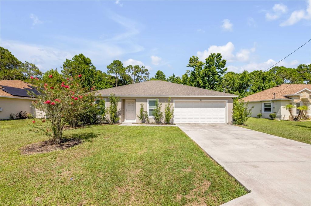 Photo of 176 Pine Grove Drive, Palm Coast, FL 32164 (MLS # NS1088812)