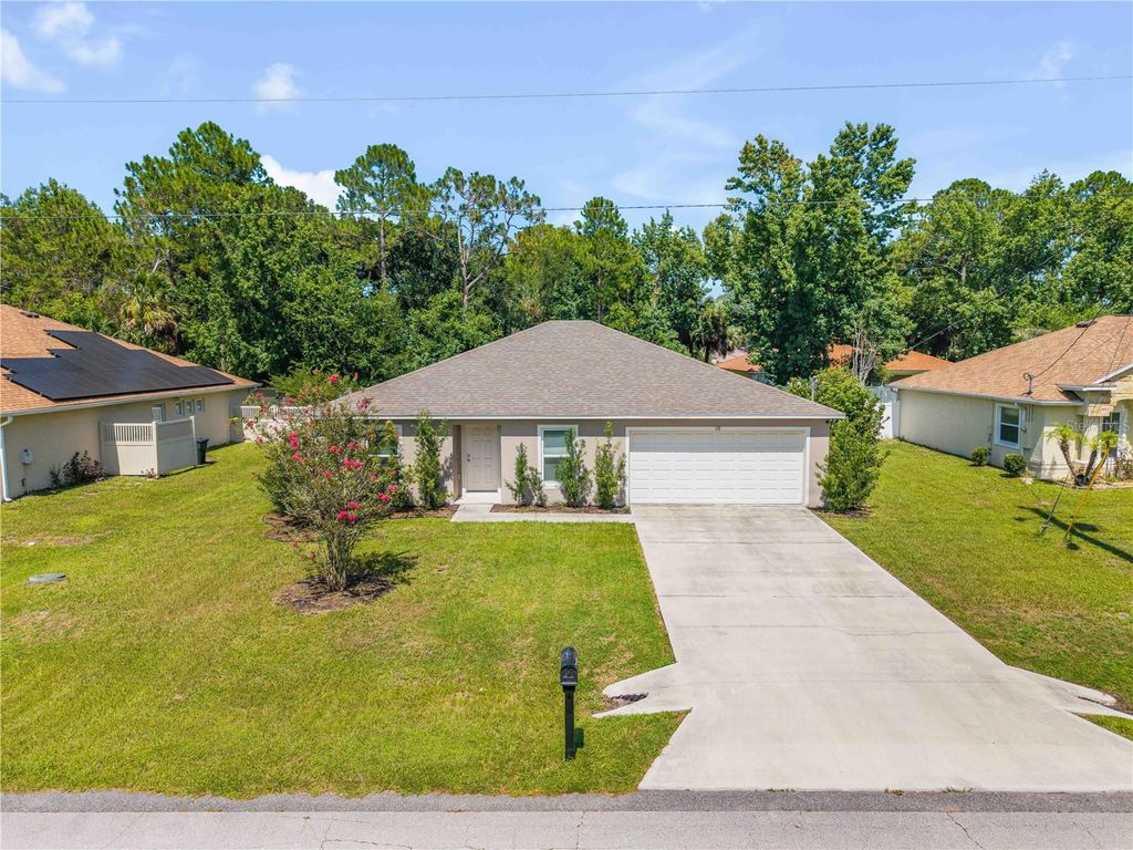Photo of 176 Pine Grove Drive, Palm Coast, FL 32164 (MLS # NS1088812)