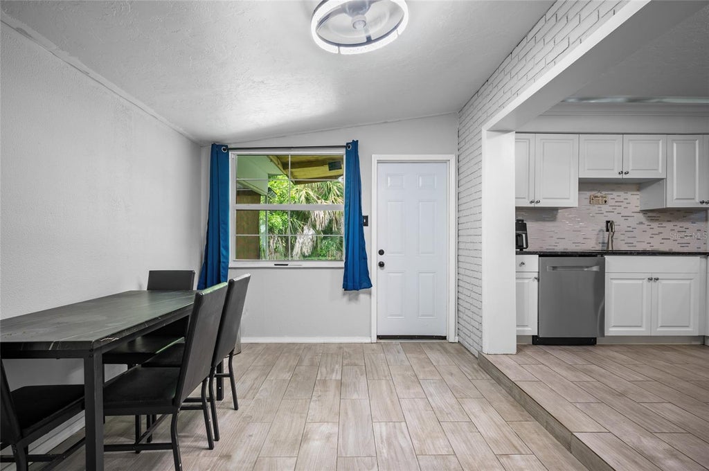 Photo of 340 Timbruce Lane NW, Port Charlotte, FL 33952 (MLS # D6148465)