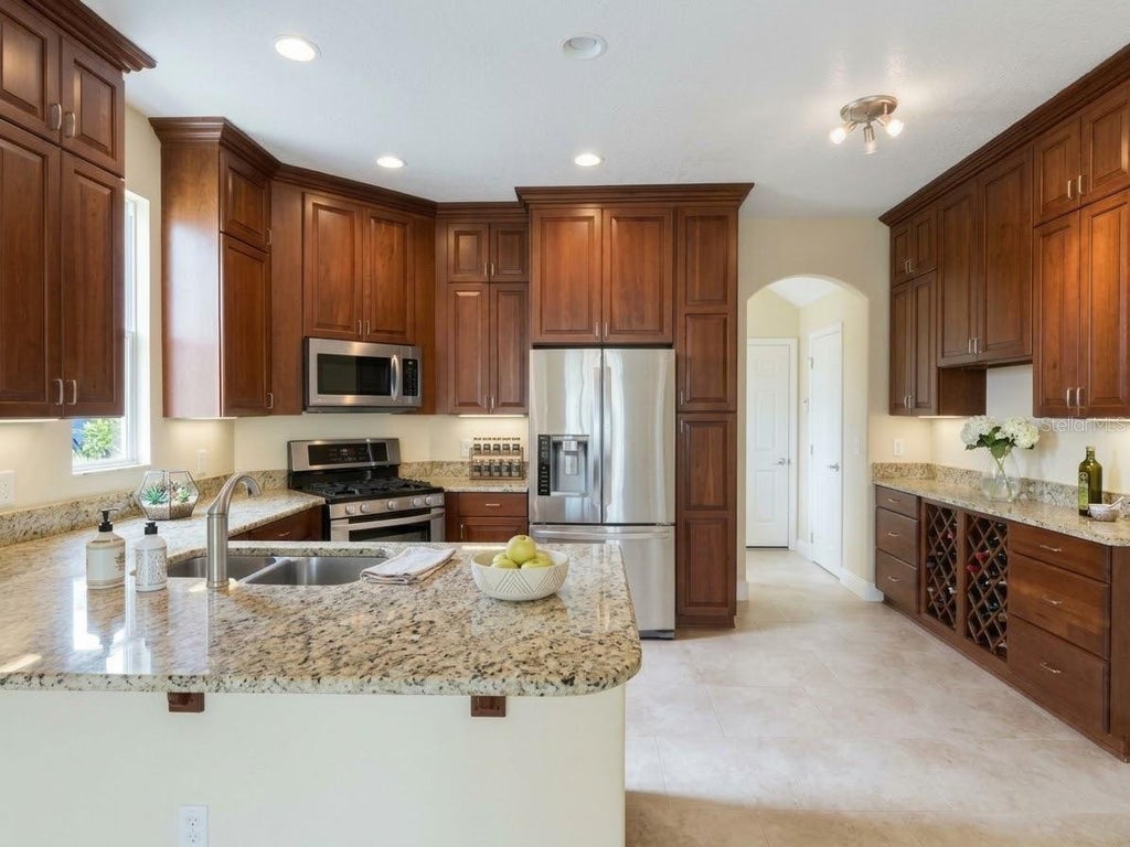 Photo of 6628 Bouganvillea Crescent Drive, Orlando, FL 32809 (MLS # O6451156)