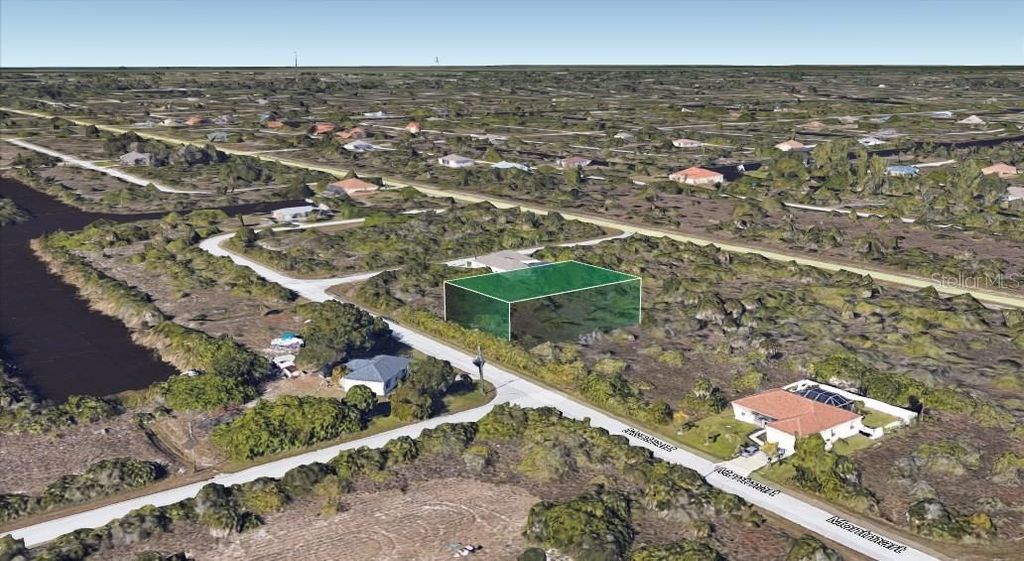 Photo of 14338 Montmarte Ave, Port Charlotte, FL 33981 (MLS # O6348726)