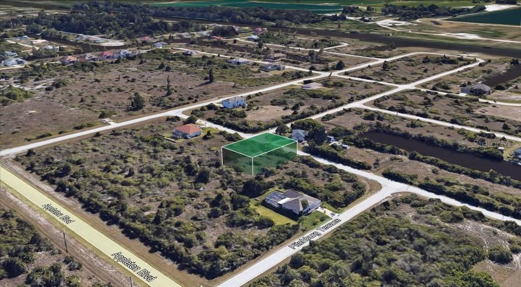 Photo of 14338 Montmarte Ave, Port Charlotte, FL 33981 (MLS # O6348726)