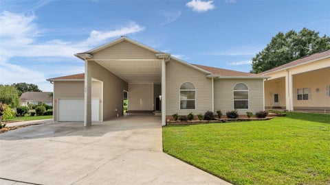Photo of 1239 Motorcoach Drive, Polk City, FL 33868 (MLS # L4964823)