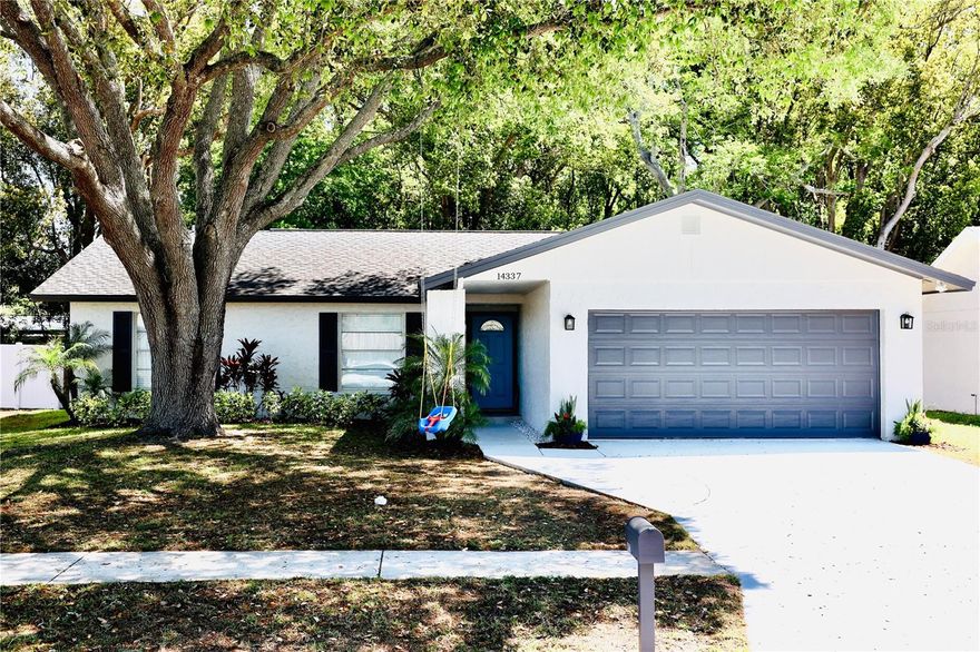 One or more photo(s) has been virtually staged. Welcome to this move-in-ready 4-bedroom, 2-bath home in Tampa that’s been thoughtfully updated for modern living. From the moment you walk in, you’ll notice the clean, updated feel with gorgeous porcelain tile in the main living areas and upgraded luxury vinyl plank flooring in the bedrooms—durable, stylish, and completely carpet-free.

The kitchen and both bathrooms have been fully remodeled with a fresh, contemporary look. Major systems have already been taken care of, with the roof, air conditioner, and water heater all replaced in 2017—giving you peace of mind from day one.

The split floor plan offers functionality and flexibility, with three bedrooms on one side of the home and a fourth bedroom or office on the other—ideal for guests, working from home, or a private retreat.

Step outside to a .18-acre lot with no rear neighbors, backing to a private conservation area that adds both privacy and a peaceful view. The backyard has plenty of room to create your dream outdoor space, including a pool and lanai.  Check out the virtual pool that could be built!

No HOA means more flexibility and fewer restrictions. Located in an area less likely to flood, and just minutes from everything the Tampa Bay area has to offer—shopping, dining, major highways, Tampa International Airport, and professional sports.

If you’re looking for updated, low-maintenance, and in a location that makes life easy—this one is worth seeing!  Schedule your private showing today!