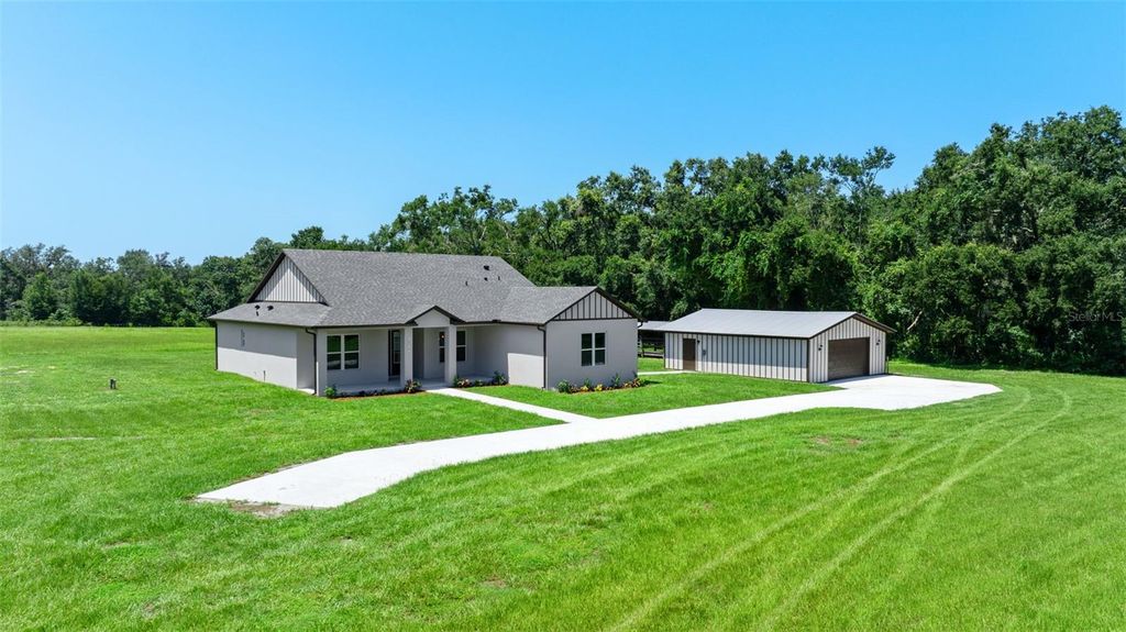 Photo of 13219 Newgent Road, San Antonio, FL 33576 (MLS # TB8424094)