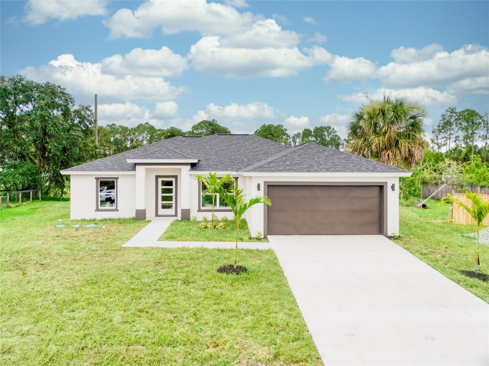 BRAND NEW Construction | Oversized Lot | No HOA | Move-In Ready!
Closing costs paid with Preferred Lender!
This brand new 4/2/2 home sits on an oversized lot next to a drainage canal for added privacy.
Enjoy modern living with a spacious, open, split floor plan, vaulted ceilings, and tile & vinyl flooring throughout and no carpet! The kitchen features an oversized quartz waterfall island, plenty of cabinets, and stainless steel, energy-efficient Whirlpool appliances. Washer and dryer included. The primary suite offers a dual-sink quartz vanity.
Includes a Comprehensive New Home Warranty for peace of mind!
Less than 10 minutes to Jupiter Elementary & Heritage High, and within a short drive to beaches, SpaceX, Patrick Space Force Base, L3Harris, and Melbourne International Airport.
Photos are of the actual home and showcase plenty of upgrades.
Schedule your tour today and come see all the quality upgrades and exceptional builder craftsmanship in person!