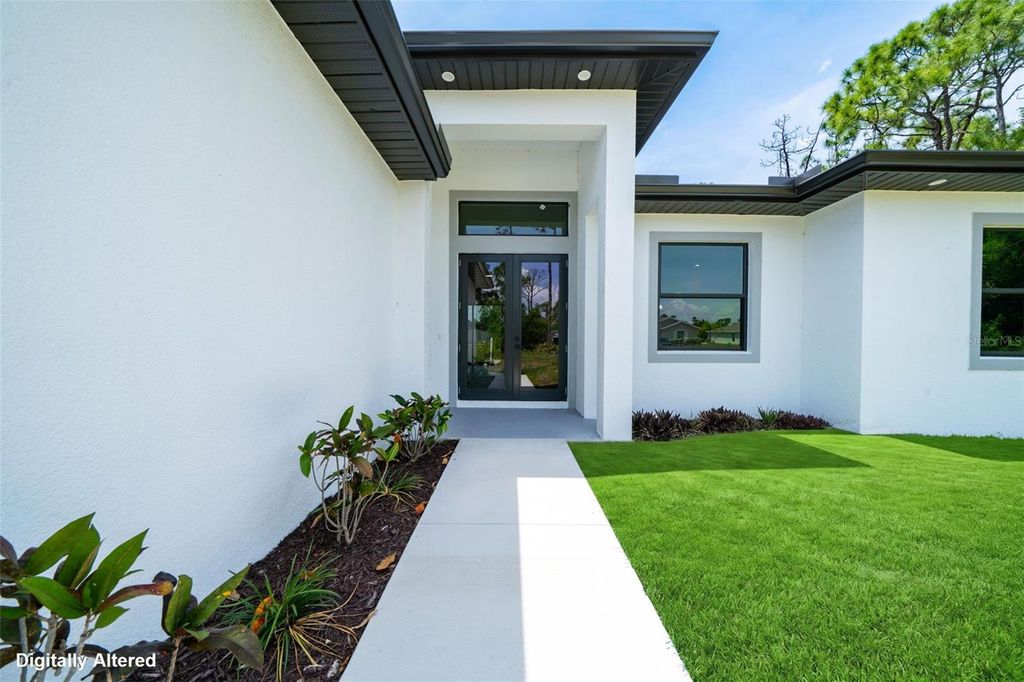 Photo of 3365 Douglas Road, Punta Gorda, FL 33980 (MLS # C7524500)