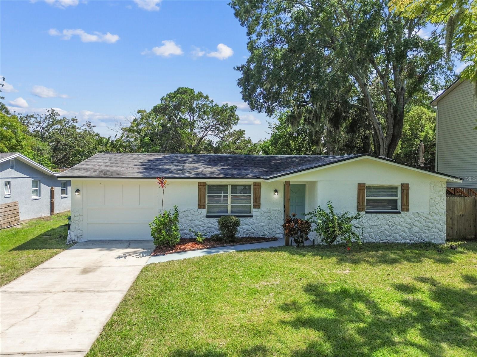 LOOK AT THIS BEAUTIFUL, RENOVATED HOME IN THE HEART OF NEW PORT RICHEY! BOASTING 3 BEDROOMS AND 2 BATHROOMS, A GORGEOUS NEW KITCHEN WITH STAINLESS STEEL APPLIANCES, QUARTZ COUNTER TOPS, AN ISLAND PROVIDING SITTING AREA FOR THE FAMILY TO ENJOY MEALS, NEW CABINETS, TWO BEAUTIFUL BATHROOMS, NEW FIXTURES THROUGHOUT, NEW LUXURY VINYL FLOORING, NEWLY PAINTED INSIDE AND OUT. THIS BEAUTIFUL HOME OFFERS A BIG FRONT YARD AND A BIG BACK YARD. BRING YOUR PICKIEST BUYER!