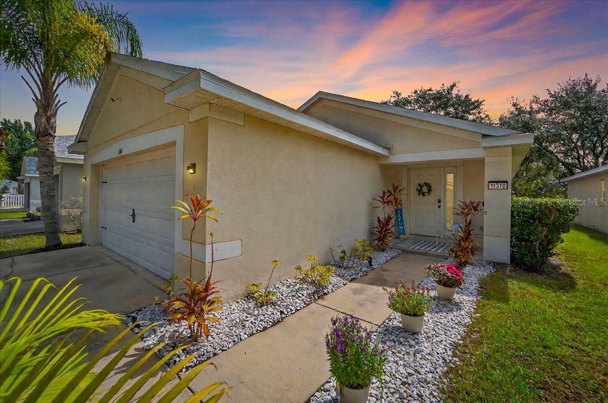 Beautifully Updated 3-Bedroom Home in Rivercrest with Pond Views & Resort-Style Amenities!! Step into this beautifully updated 3-bedroom, 2-bathroom retreat in the highly sought-after Rivercrest community—where serene pond views, modern upgrades, and a vibrant neighborhood lifestyle come together. Perched in a peaceful, established neighborhood, this move-in-ready home offers a brand-new AC system (2024), new roof (2022), and new water heater (2023) for year-round comfort and efficiency. A two-car garage plus a 2023 washer and dryer add to the everyday convenience. Inside, the updated flooring (2022) flows seamlessly throughout, leading to a stunning kitchen with sleek cabinetry, elegant countertops, and brand-new stainless-steel appliances. The primary bedroom features an tastefully updated en-suite bathroom and a spacious walk-in closet, providing the perfect private retreat. Both bathrooms have been transformed into spa-like sanctuaries, perfect for unwinding at the end of the day. Step outside to your expansive cement patio—ideal for relaxing, dining, or entertaining—while taking in tranquil pond views. Living in Rivercrest means enjoying top-tier amenities, including a clubhouse, resort-style pool, playground, lighted tennis & basketball courts, and scenic nature trails winding around parks and ponds. Additionaly this home stayed dry and undamaged during two hurricanes and Never lost electricity during storms! Schedule a showing today!