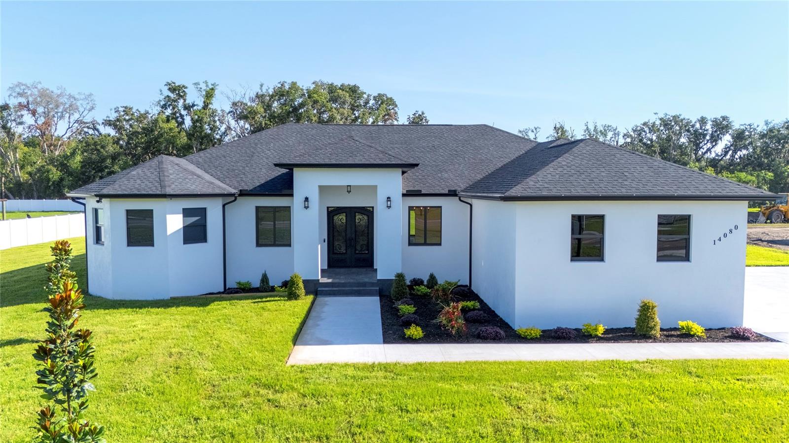 THE LIST PRICE REPRESENTS THE OPENING OFFER AMOUNT (NET TO SELLER). AGENTS - PLEASE VIEW REALTOR REMARKS IN THE MLS.
Stunning Modern Custom Home on Over an Acre in Dover! Welcome to this newly built contemporary masterpiece nestled on 1.05 acres near Diamond Hill Golf Club. This 4-bedroom, 3.5-bath home is thoughtfully designed with high-end finishes and custom craftsmanship throughout. The luxurious primary suite features a spacious walk-in closet that leads to a spa-like bathroom with a freestanding tub and dual-entry shower. An en suite bedroom offers its own private bath, while two additional bedrooms are connected by a stylish Jack & Jill bath. Enjoy elegant porcelain tile flooring, quartz countertops throughout, and floor-to-ceiling custom cabinetry with solid wood doors. The chef’s kitchen boasts stainless steel appliances, a large quartz island, and an abundance of storage. The grand living room showcases a custom wood accent wall, electric fireplace, and built-in TV mount—perfect for entertaining. Step outside to the covered patio and custom outdoor kitchen, ideal for gatherings and Florida living. The oversized 3-car garage features high ceilings, and the expansive driveway accommodates up to 16 vehicles. Other highlights include 8-ft tall 5-panel interior doors and a stunning wrought iron main entrance. This home is a rare blend of elegance, function, and style—don't miss your opportunity to own this exceptional property in a prime Dover location!
•
Please schedule all showings online via Showing Time.
Offers will be accepted through Wednesday, July 30, 2025 at 2:00 pm.
AT SELLER'S DISCRETION, AN OFFER MAY BE ACCEPTED AT ANY TIME.