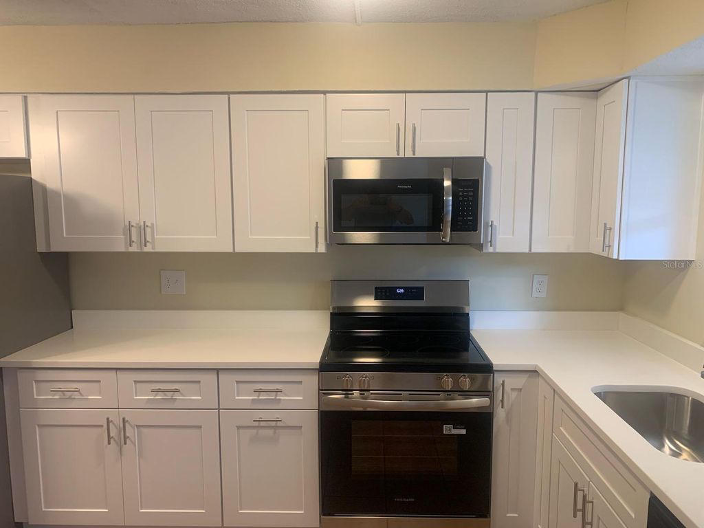 Photo of 7338 Coquina Way #2, St Pete Beach, FL 33706 (MLS # TB8439124)