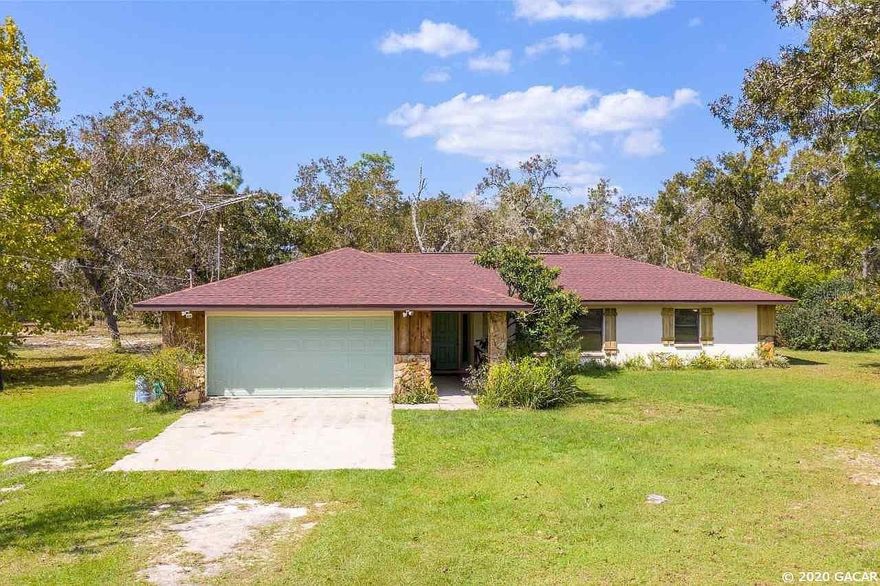 Plenty of peace, quiet, and wildlife to enjoy! This lovely 3BR/2BA concrete block home sits on 5 acres in the unique fly-in community of Melrose Landing. The home has just been freshly painted inside and out and features porcelain tile flooring throughout, new HVAC in 2019, and a new roof in 2018. Upon entering the foyer and passing through the family room, you are greeted by a bright and open, large living area next to the kitchen and separate dining room. The home also has many closets for extra storage. In addition to the attached two car garage, the property includes a covered metal carport, and the entire perimeter of the property is fenced with a cross fenced backyard. Enjoy relaxing and entertaining on the back patio, watching the deer, and picking fruit from your various citrus trees! Located just minutes from Lake Santa Fe and the many beautiful lakes in the historic Melrose area this home is also an easy commute to Gainesville. Don't miss your chance to see this wonderful home! Call today to schedule your showing!
Read less