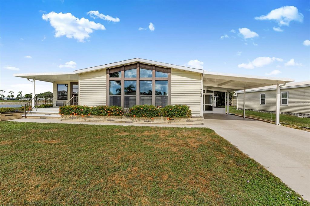 Photo of 702 Del Luna Drive, North Port, FL 34287 (MLS # TB8441011)